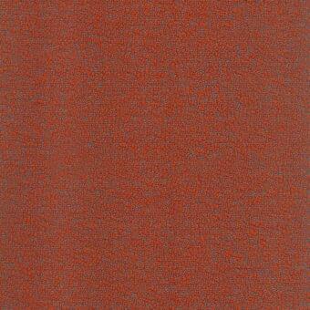 Orange textile sample with small dark blue dots, exhibiting a dense, uniformly speckled pattern and a tight matte weave.