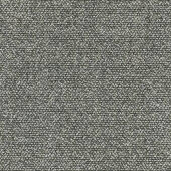 MDF Italia fabric sample, muted gray-green, dense granular texture with irregular elements and a matte finish, studio lighting.
