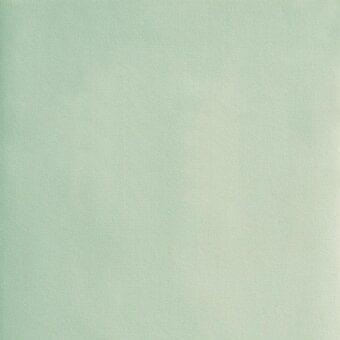 MDF Italia Sunday fabric swatch in light green r610, col. 032, displays a matte, tightly woven texture with a consistent pale green tone and grid pattern.