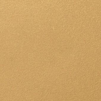 Fine texture paint sample, desert gold color, granular surface with matte finish, consistent texture, studio lighting, Masiero Giardini 2023 collection.