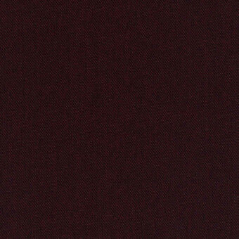 Burgundy woven fabric texture, “trame (bombay) 63 uva grapes” pattern, with scattered reddish-brown dots and a matte, granular finish.