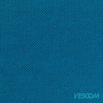 Sapphire blue Vescom textile features a dense, woven fabric texture with a uniform pattern and subtle granular surface detail.