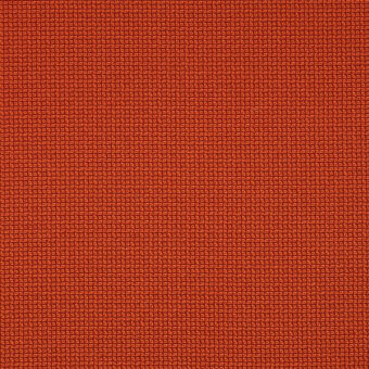 Orange metric lava fabric texture from miniforms’ metric maharam collection, displaying a dense, repeating square node pattern.