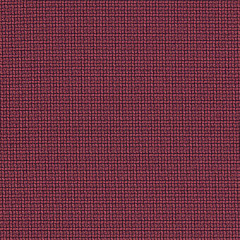 Red textile sample with dense square perforations, creating a granular woven texture; metric 44 kiln fabric from Miniforms Maharam collection.