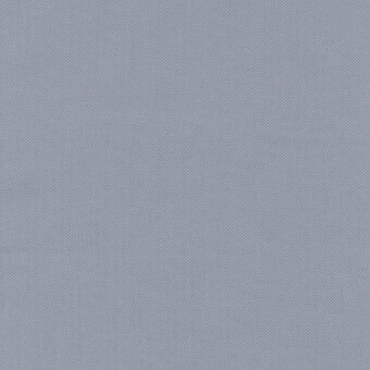 Gray textile sample with a fine diagonal weave and matte finish, exhibiting a granulated texture from the Kvadrat Nuvolo collection.