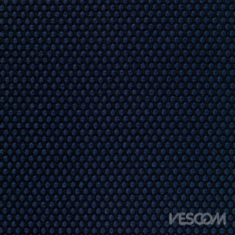 Vescom Rolla Blu Notte textile, midnight blue fabric with repeating raised circular dot pattern and subtle sheen.
