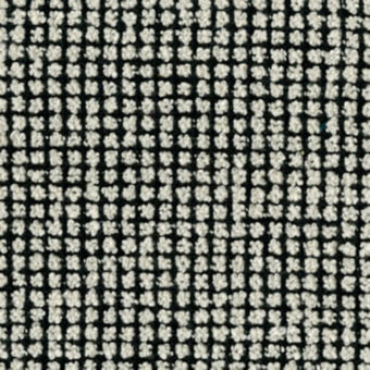 Textile sample with repeating circular pattern in off-white and dark gray, featuring looped texture and dense woven structure.