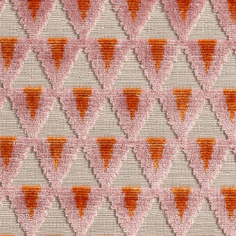Coral pink looped-pile textile with repeating inverted triangle geometric pattern on a light beige background, Dedal fabrics.