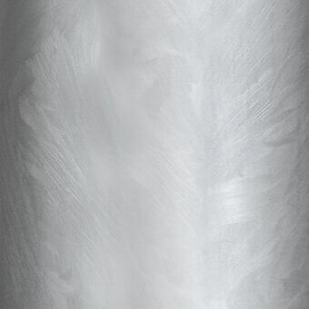 Zinc coated metal texture with vertical brushstrokes, matte finish, cool gray tone, layered and uneven surface, miniforms collection.