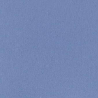 Periwinkle cotton fabric swatch displaying a matte, uniform weave and subtle vertical grain, from the Modo Luce cotton collection.