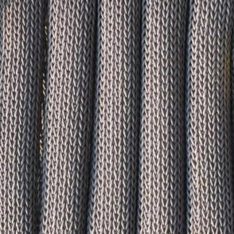 Braided textile wall with vertical columns, gray and beige rope fibers, dense weave pattern, studio lighting, Moroso fabric detail overlay.