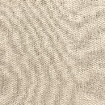 Beige woven fabric texture with a natural grain, dense matte finish, and visible fiber variations; label reads "moroso capri col. sand."