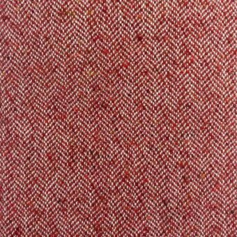 Moroso House of Lords fabric, ruby red herringbone weave with off-white and gold flecks, dense wool-blend texture, matte finish.