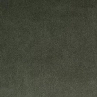 Olive-green fabric sample with woven texture, displaying tonal variations and granular surface; label reads "moroso roxana cs silver – q."