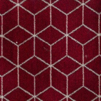 Geometric textile sample, red and white woven fabric, repeating hexagon grid pattern; Moroso “Block” A8820 fabric.