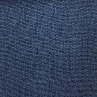 Moroso Canapa Denim fabric sample, deep blue woven textile with grid pattern and visible product code a7015, studio lighting.