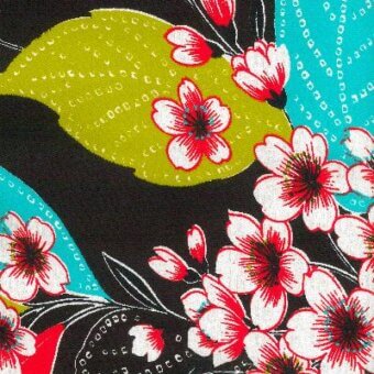 Floral textile pattern with black background, white cherry blossoms, red buds, green leaves, turquoise dots, and textured light green patch.