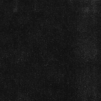 Charcoal gray fabric swatch displaying a dense, granular texture with scattered light flecks, matte finish, and uniform surface; label reads "moroso solemio ash."