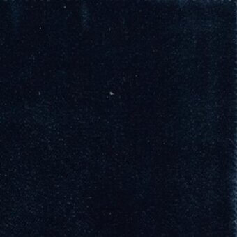 Indigo fabric sample displaying a dense, velvety texture with a mottled effect and frayed edges, identified as Moroso Solemio A6982.