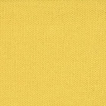 Moroso Spritz 20 fabric swatch in yellow with a matte finish, displaying a tight weave and partial label text: “spritz 20 yellow.”