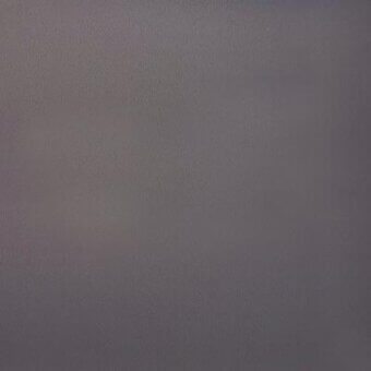 Fabric texture gradient from charcoal to light gray, displaying a matte granular finish with imprinted text “moroso stamkin zen F4350 5065”.