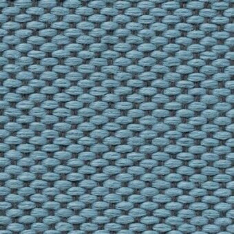 Moroso Wilson fabric texture, muted blue denim weave, repeating pebble pattern, durable upholstery material, Wilson 7067.14 collection.
