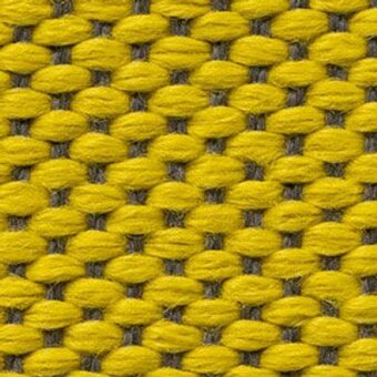 Moroso Wilson fabric sample, lemon yellow woven texture, geometric grid pattern with raised nodes, labeled “A9117 – Wilson 7067.21.”