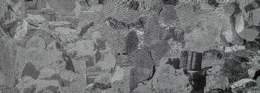 Moroso fabric sample, grey textured weave, granular ‘Rocks All Over’ pattern, labeled ‘A6146’ with product code and ‘Atypical Pick’ designation.