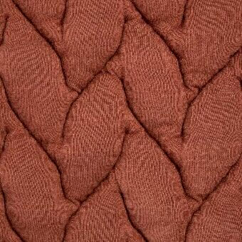 Moroso fabric sample, reddish-brown braided texture, repeating diamond quilt pattern with visible material code ‘big braid e991 11283 oxidored’.