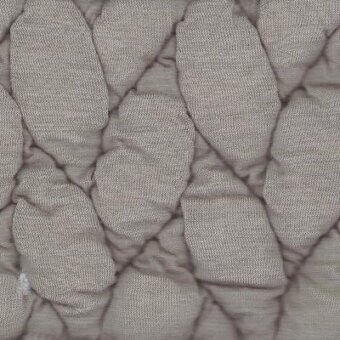 Moroso fabric sample, greige Big Braid textile, displaying a quilted diamond pattern with dense interwoven braid texture and matte finish.