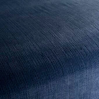 Moroso fabric sample, sapphire blue woven textile, dense matte texture with directional yarns, labeled “Big Punch ch3125 051 sapphire – w”.