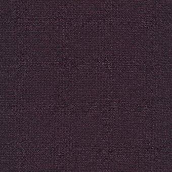 Moroso Rico fabric sample in plum displays a dense, granular weave with a uniform texture and a visible product label detailing color code 989.240.