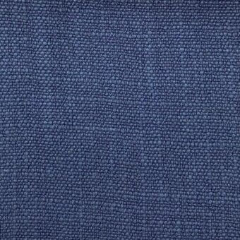 Deep blue fabric texture with a repeating pebble pattern, tightly woven with raised circular elements; label reads “moroso zoran 116 blue”.