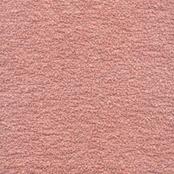 Mottled rose fabric swatch displaying a dense, granular texture with a matte finish and looped yarn construction, exhibiting subtle tonal variations.