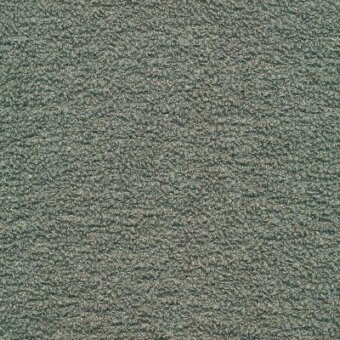 Verdigris fabric sample displaying a granular, mottled texture with visible Moroso branding, code a8281, and color designation ‘clunis 779.000’.