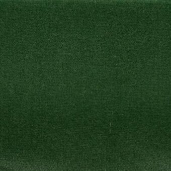 Emerald green velvet fabric sample with uniform pile texture, labeled “moroso london a7067 – london l069 emerald – y” in lower right.