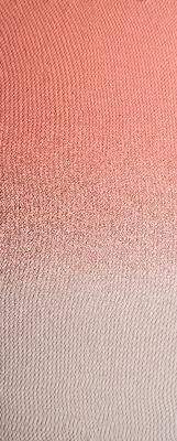 Coral and off-white knit fabric texture with vertical ribbed pattern and subtle sheen, displayed as a gradient color sample.