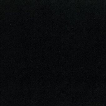 Black fabric texture sample with granular weave, displaying subtle tonal variations and “moroso feral a6704 – feral 17308 006 black – z” text.