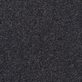 Moroso fabric sample, dark gray textile, dense weave with mottled texture and lighter flecks, labeled “Zanzibar 7059.17 Ardesia.”