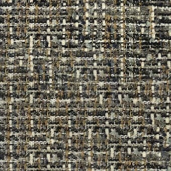 Woven tweed fabric sample with gray, beige, and gold yarns displaying a dense, irregular texture and matte finish; label reads “pacini & cappellini”.