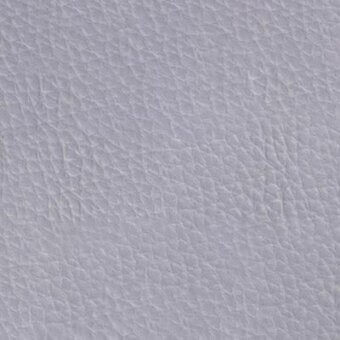 Paciini & Cappellini glicine 9026 leather texture, light lavender, mottled surface with granular texture and irregular lines.
