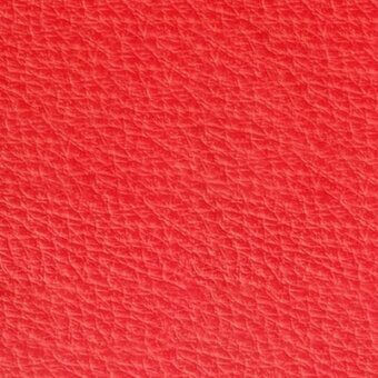 Red leather texture sample, Pacini & Cappellini Melograno 9017, displaying a granular, pebbled surface and matte finish.