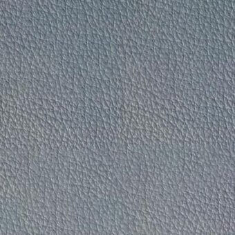 Leather texture sample, muted gray-blue, with a fine granular pattern of irregular lines and small bumps, matte finish, diffuse lighting.