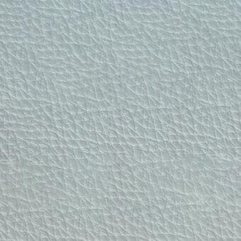 Light blue pebble-grain leather texture, Pavone 9039, displays a dense, irregular pattern and consistent matte finish with subtle tonal variations.