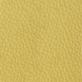Pale yellow Taiga leather texture with a dense, irregular grain and matte finish; sample displays interwoven lines and consistent density.