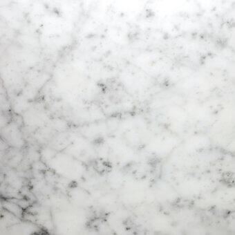 BC White Carrara marble texture with dense grey veining, irregular branching patterns, polished finish, and smooth, mottled surface.