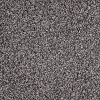 Gray bouclage fabric texture with looped pile, nubby surface, and tonal variations; Porada fabric (b) – 22.