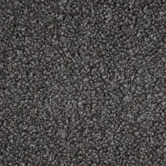 Dark gray bouclage fabric texture with looped pile, heathered tone, and nubby surface; soft, plush appearance with diffused lighting.