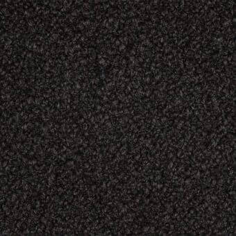 Dark gray bouclage fabric texture, Porada brand, with dense looped fibers creating a nubby, matte, and dimensional surface.