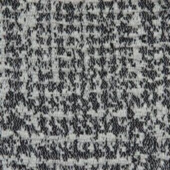 Porada fabric (b) 800, mottled black, white, and gray woven textile with a granular, matte texture and irregular dot pattern.